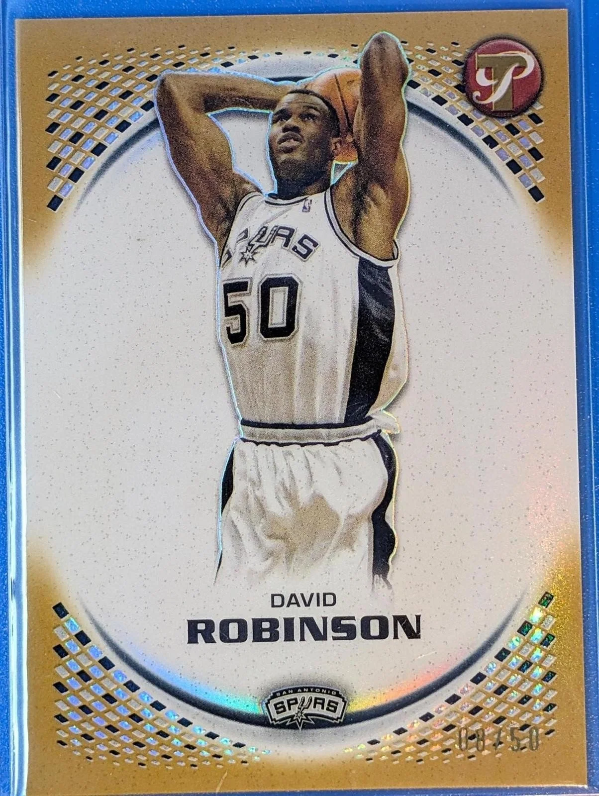 Front of 2025-26 Topps Pristine /50 David Robinson Gold #107