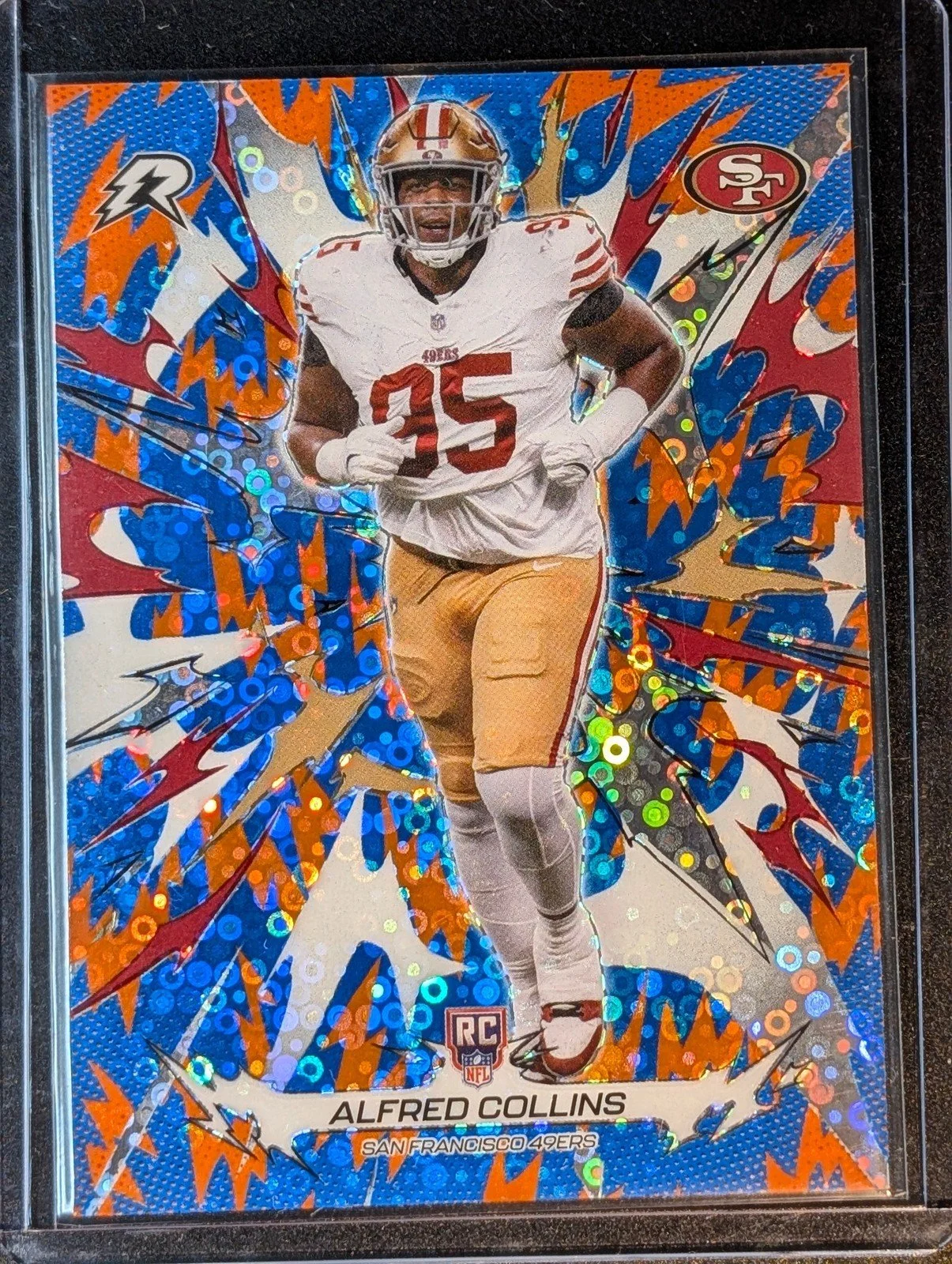 Front of 2025 Topps Resurgence #186 Alfred Collins Blue & Orange Spark Refractor