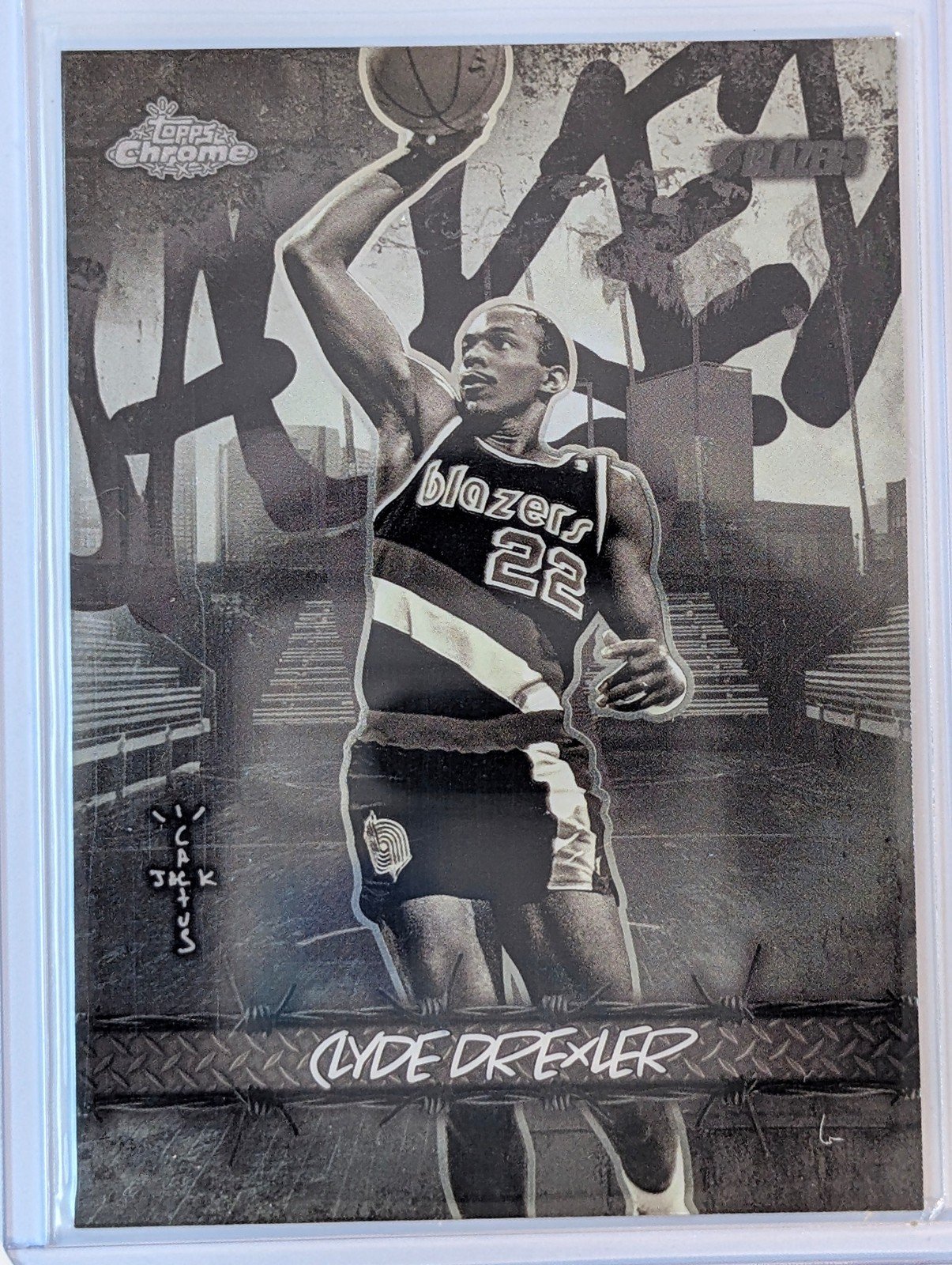 Front of 2025-26 Topps Chrome Cactus Jack #JU-38 Clyde Drexler Jacked Up
