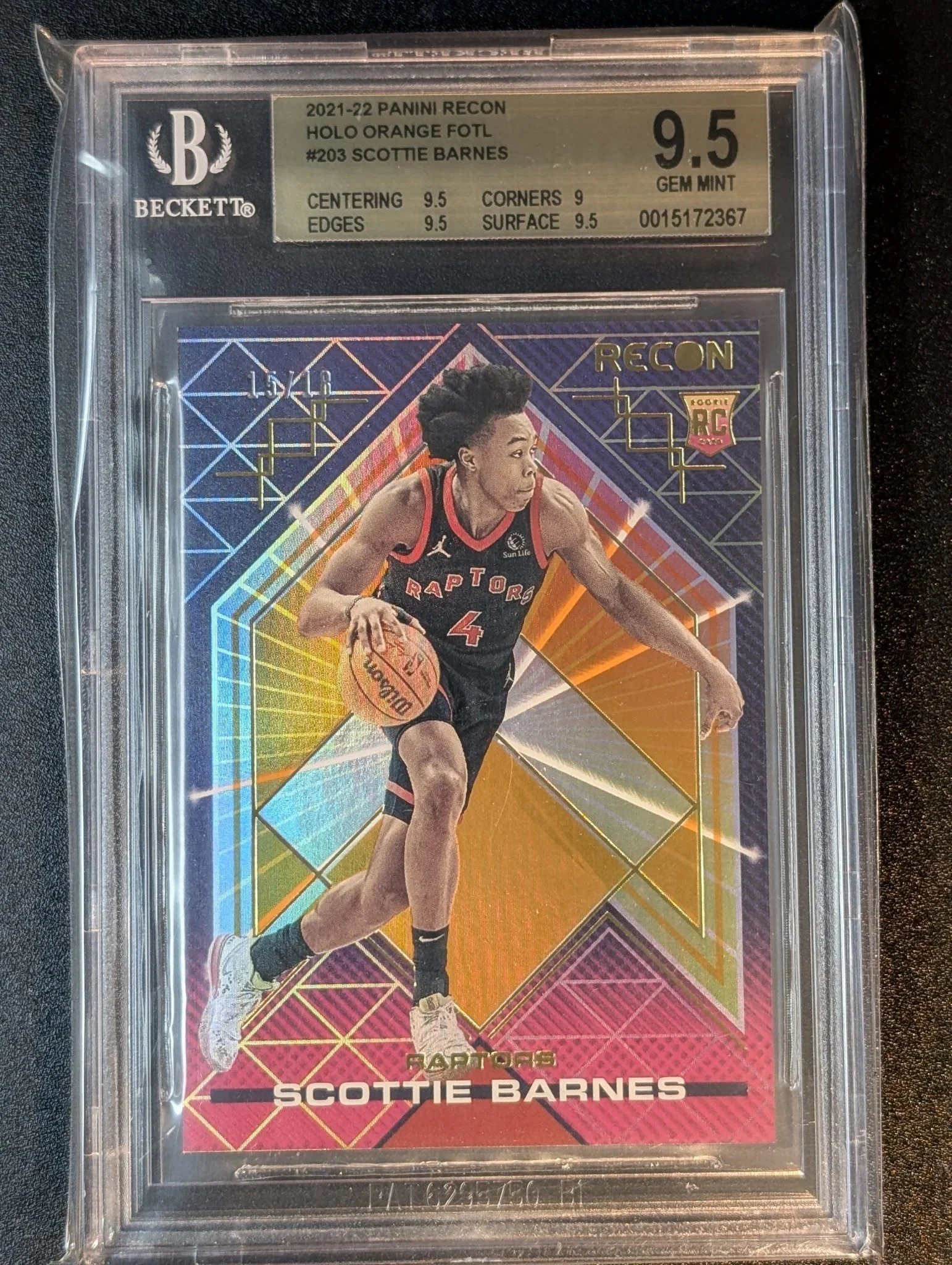 Some rainbows you chase. This one is already on the shelf.

Scottie Barnes &mdash; 2021-22 Panini Recon Holo Orange, a First Off The Line exclusive numbered to just 18 copies, from his Rookie of the Year season. Already graded BGS 9.5 and photographe