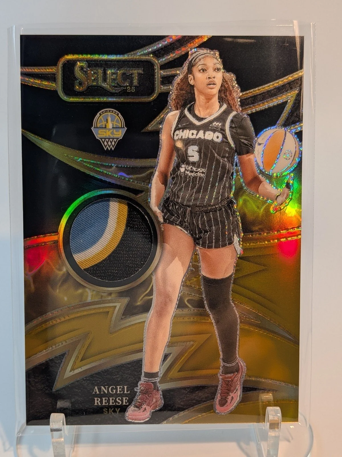 Today's spotlight: Angel Reese &mdash; Sparks Black Gold Color Match /5, jersey match 5/5
A jersey match 5/5 &mdash; the stamped number matches her jersey &mdash; numbered to just 5 copies in a Black Gold Color Match finish. Angel Reese star power in
