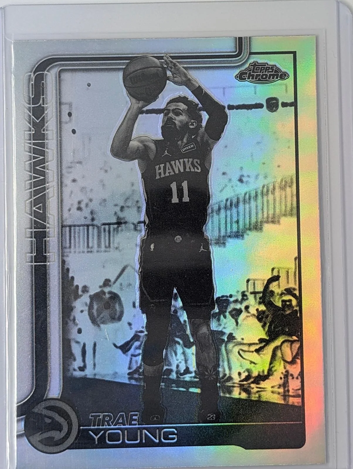 Front of 2025-26 Topps Chrome Update #36 Trae Young Negative Reractor