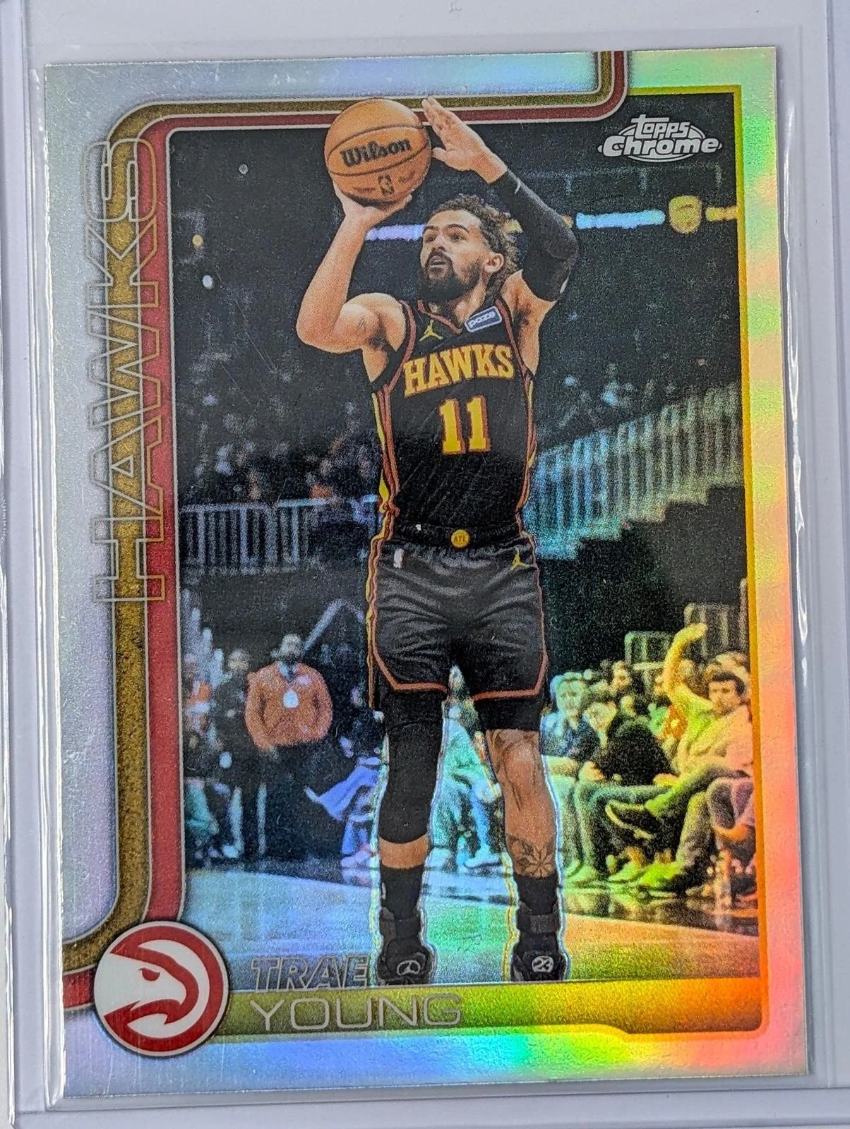 Front of 2025-26 Topps Chrome Update Trae Young Refractor #36