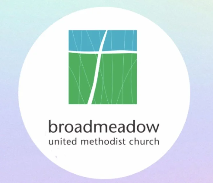 Logo of Broadmeadow United Methodist Church featuring a stylized tree with a blue top and green bottom, and the church's name below.