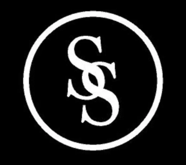 Black background with a white circular logo containing intertwined letters S and S.