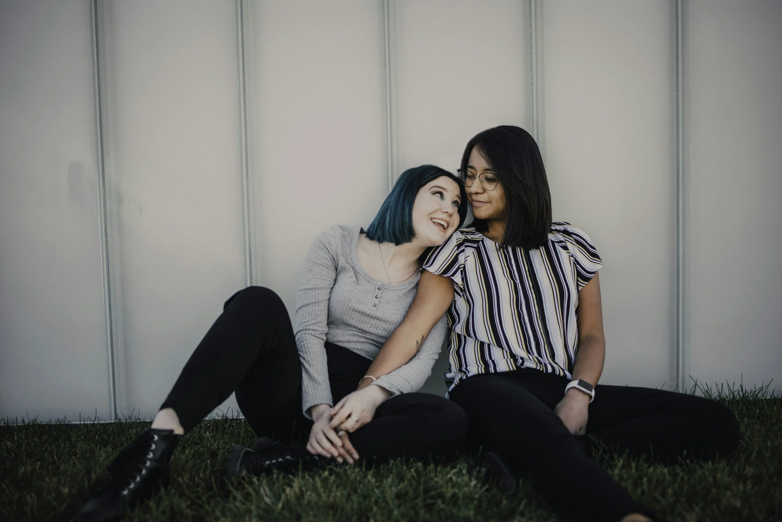 Same sex couple sitting after therapy appointment with Fertility Counselor, Keri Sipek, LMFT, PMH-C.