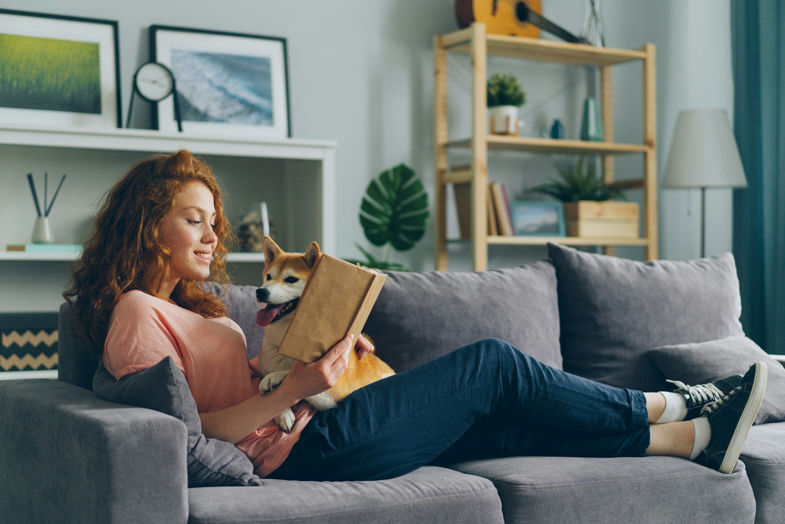 Woman sitting reading fertility book recommended by Fertility Counselor, Keri Sipek, LMFT-PMH-C at The Therapy Place of Maryland.