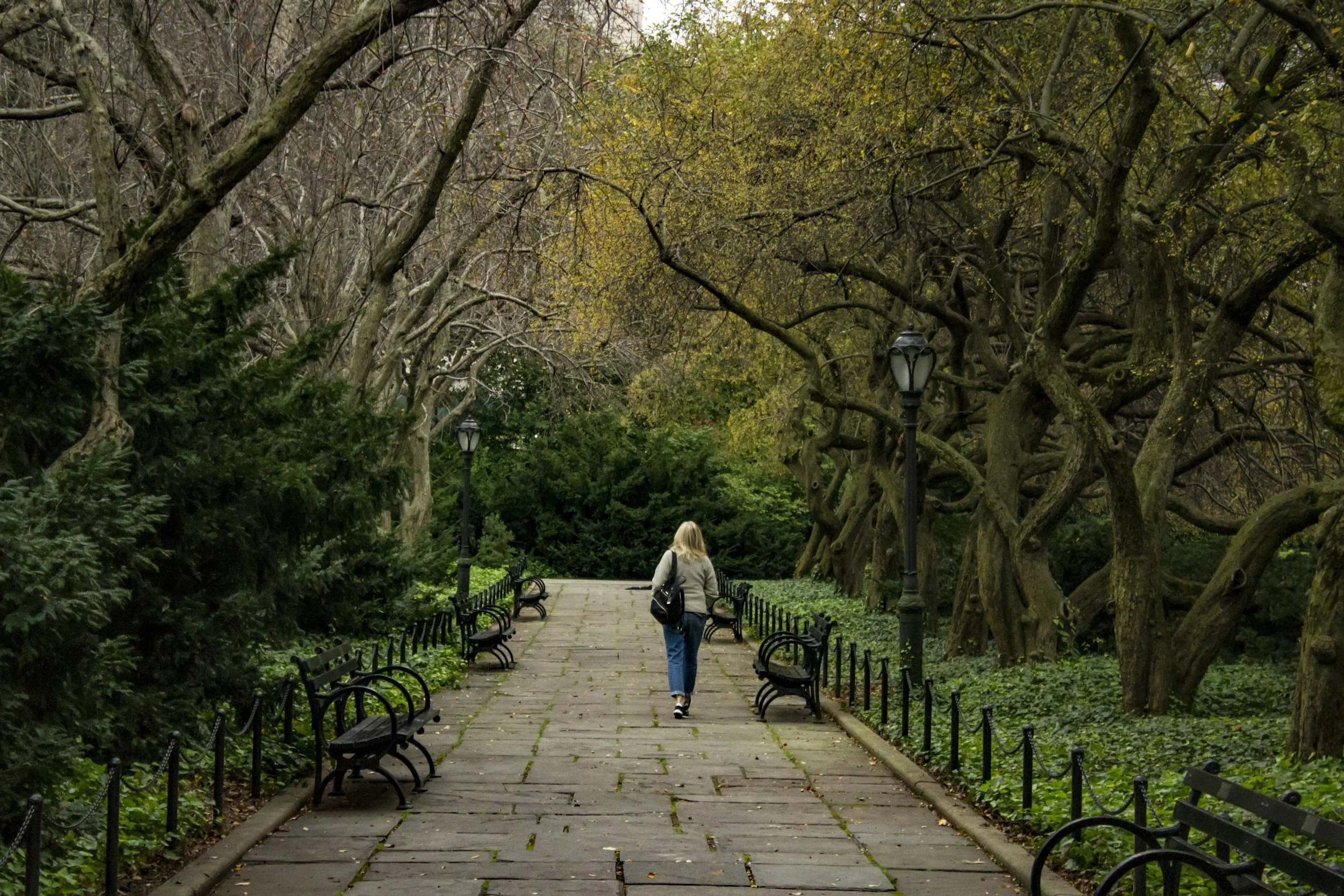 Woman walking through park after fertility counseling with, Keri Sipek, LMFT, PMH-C at the Therapy Place of Maryland