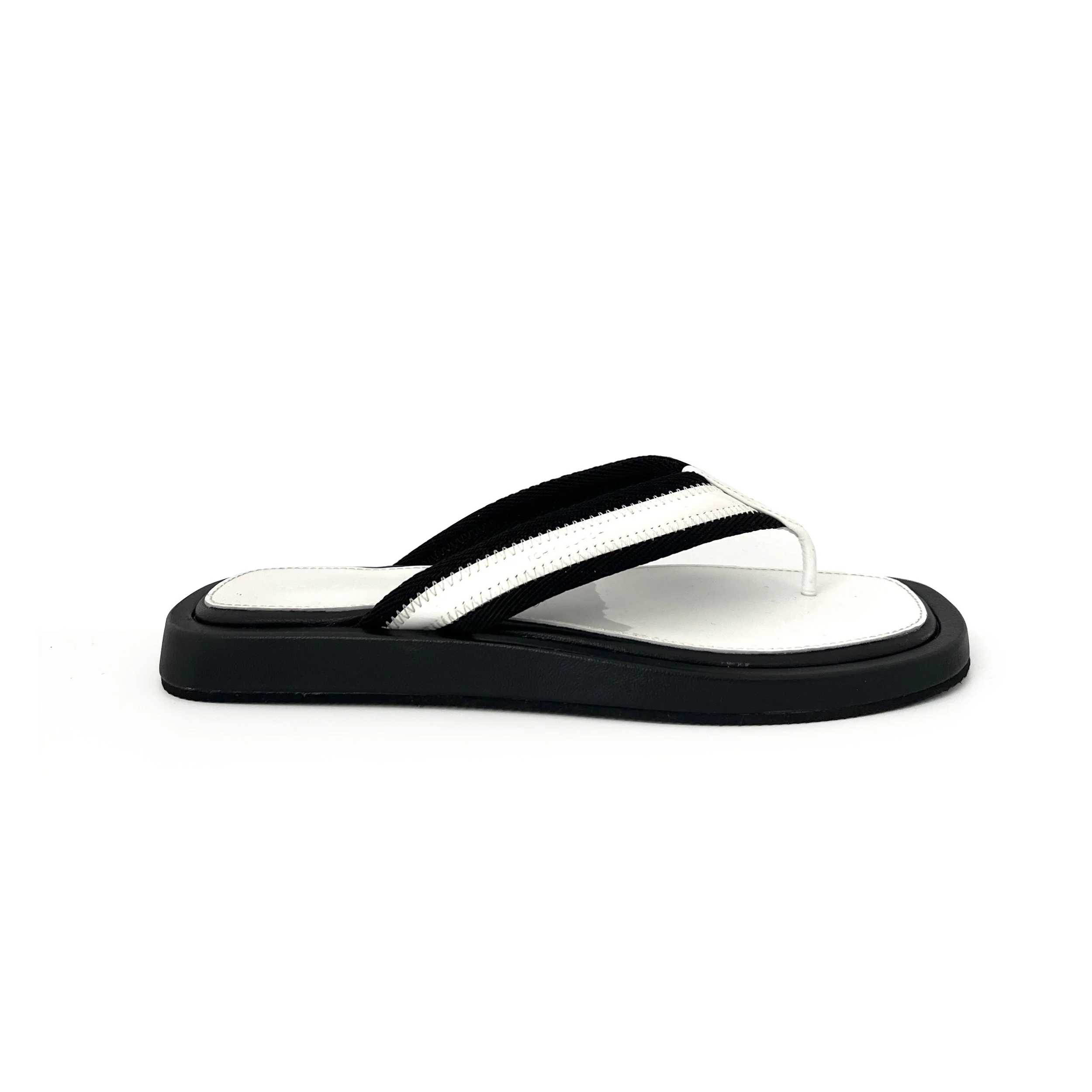TORY BURCH WHITE PATENT FLIP FLOP NO BACKGROUND copy.jpg