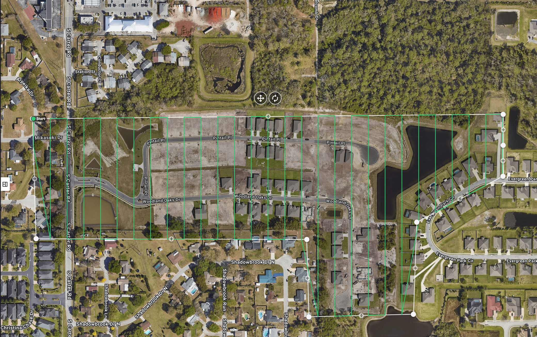 Aerial view of a suburban neighborhood with roads, houses, parks, and a pond. The image includes a marked GPS trail line with elevation contour lines overlaid.