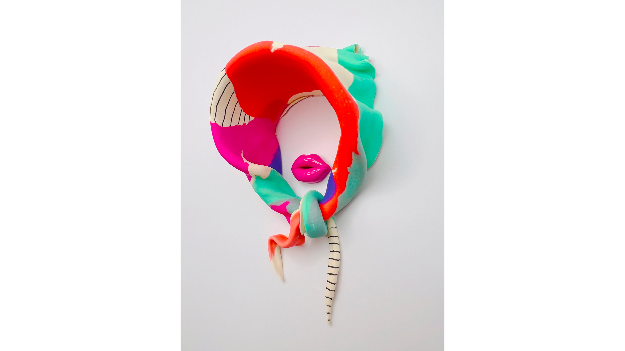 Colorful abstract sculpture with shades of pink, orange, green, cream, and black stripes on a white background.