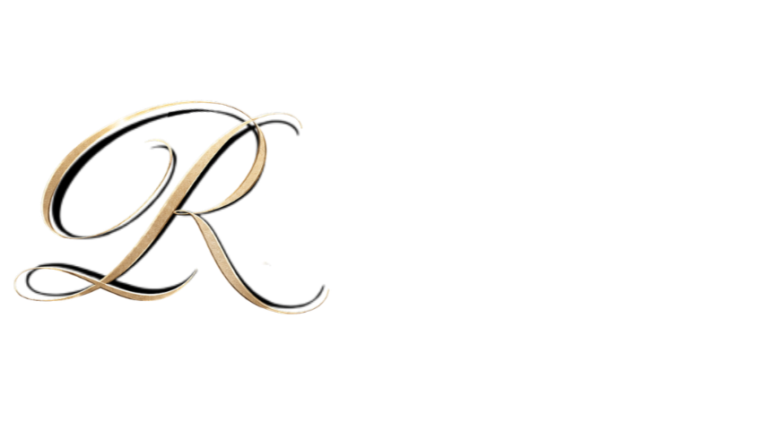 The Reserve at Jacksonville logo. A close-up of a decorative letter 'R' in script font with a yellow highlight extending to the right.