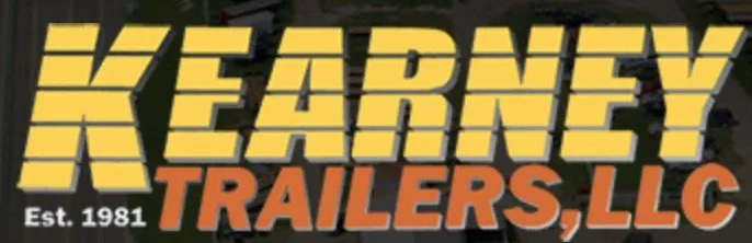 Logo for Kearney Trailers LLC with yellow and orange text on a black background.