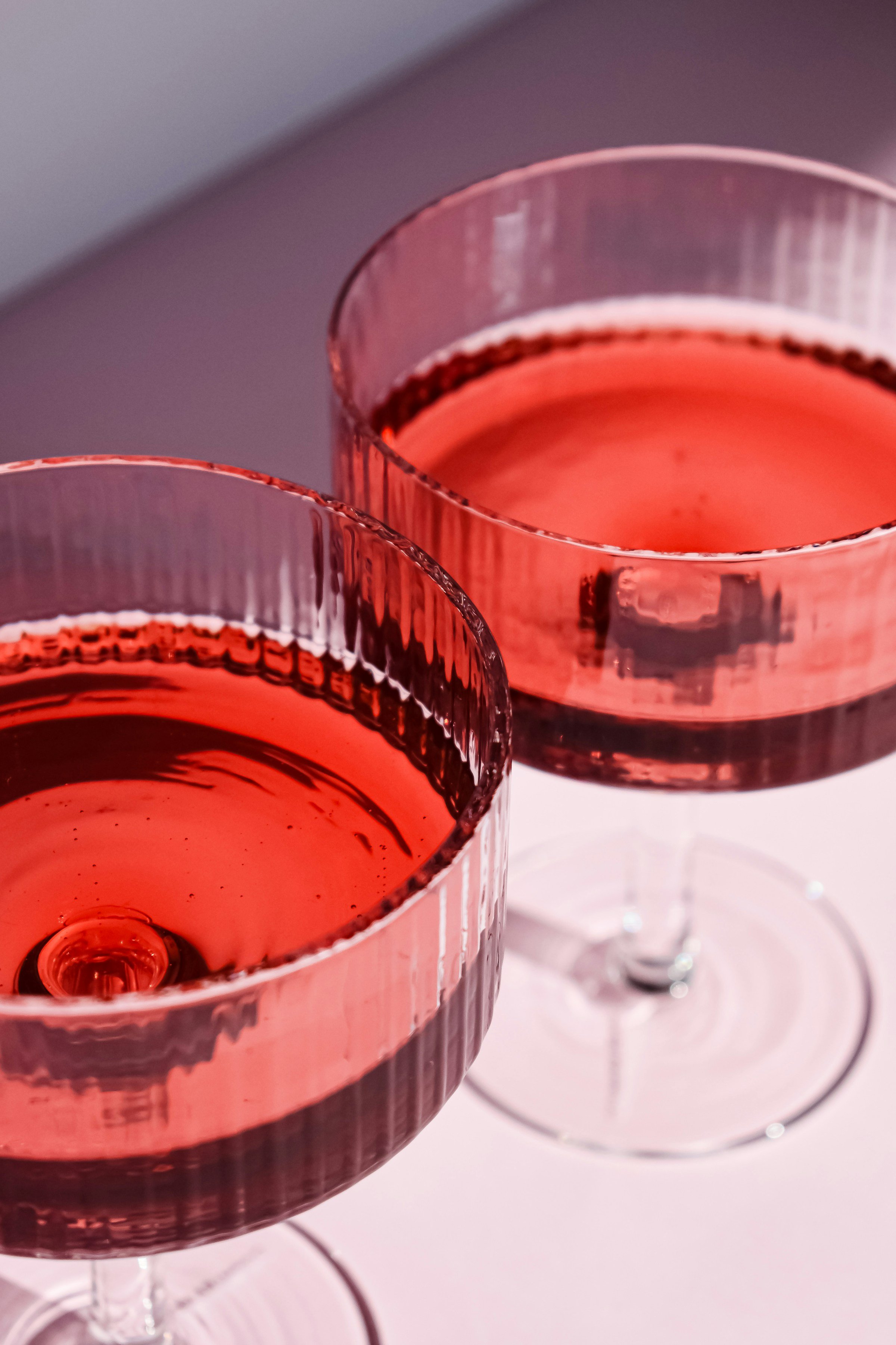The coupe glass is one of the most iconic cocktail vessels, known for its elegant curved bowl and stemmed base. Originally designed for sparkling wine, it has become a staple in modern cocktail culture.