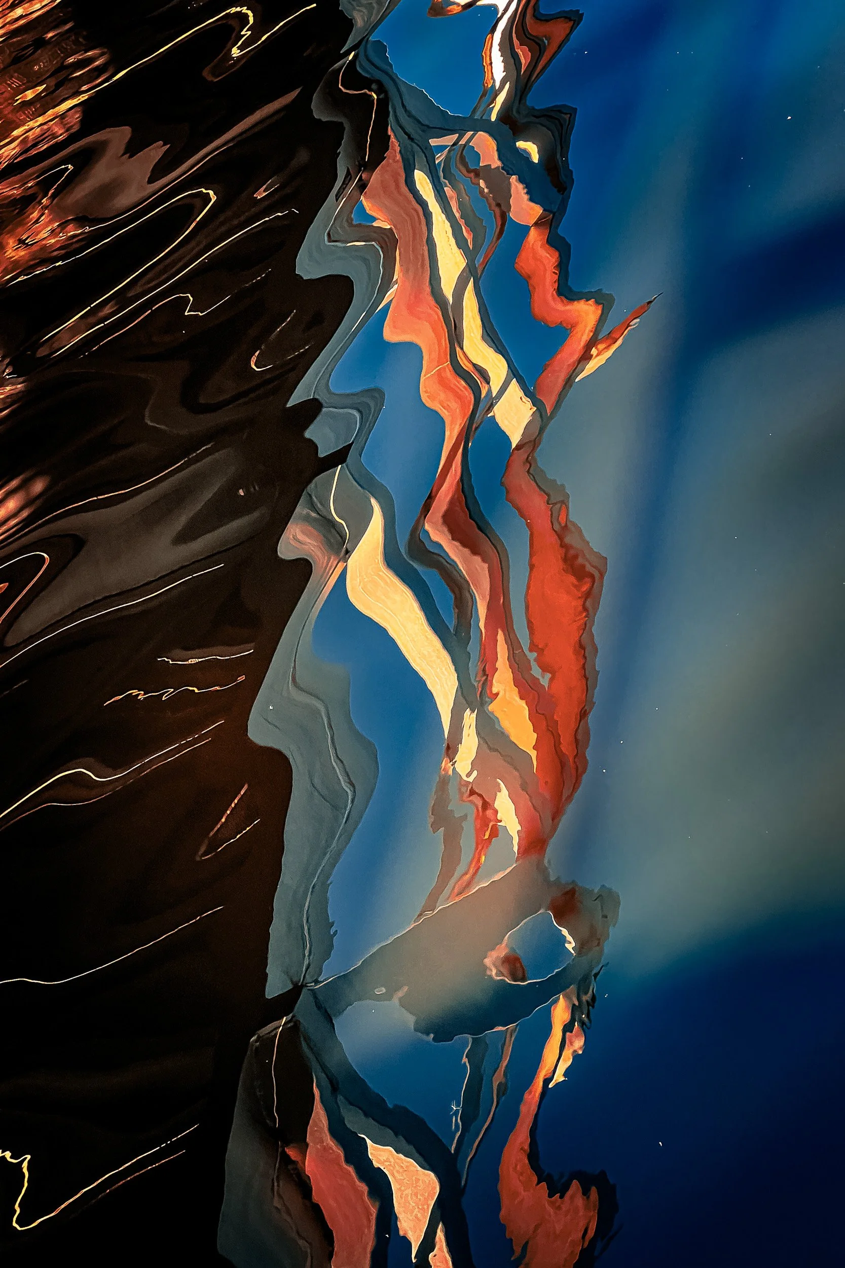 Abstract painting of mountain landscape with blue sky and colorful orange, red, yellow, and black formations. Reflective water mirrors the scene with vivid streaks.