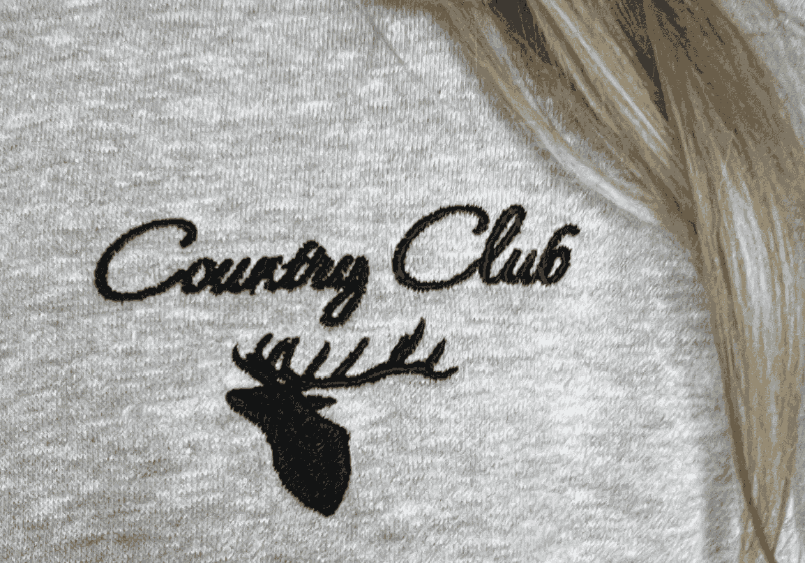 Black Country Club logo embriodered on to a marle grey hoode