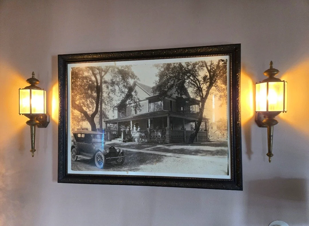 Sconces next to Antique Photo