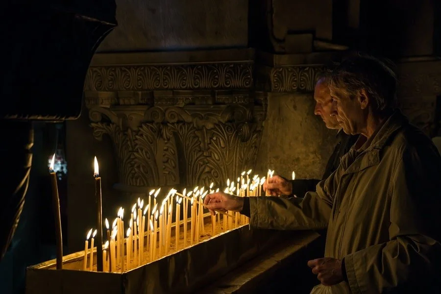 Lighting candles in ceremony