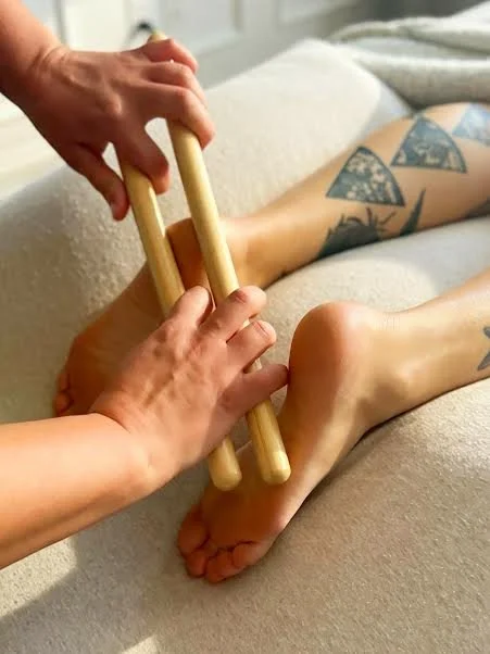 Bamboo foot reflexology session at Rooted Moon Wellness in North Portland