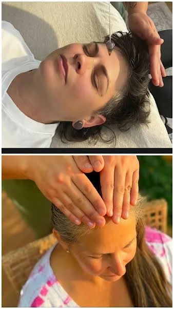 Woman receiving a facial massage and another woman receiving a head massage outdoors.