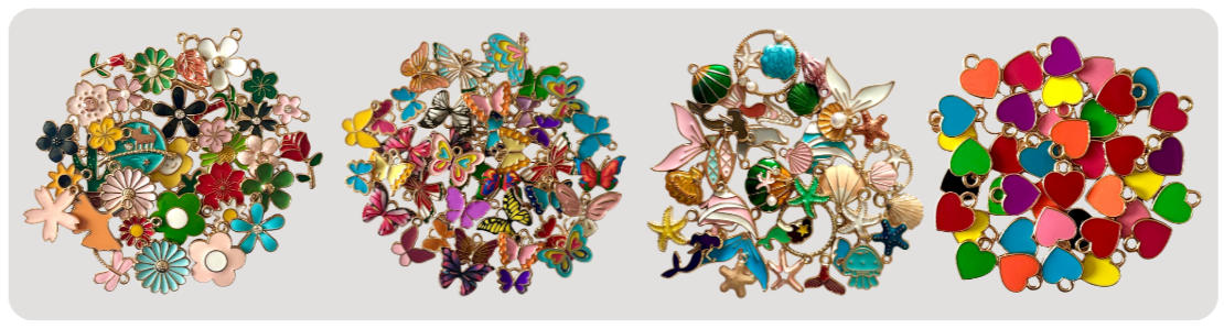 Four sets of colorful charms, including flowers, butterflies, sea creatures, and hearts, arranged in separate piles.