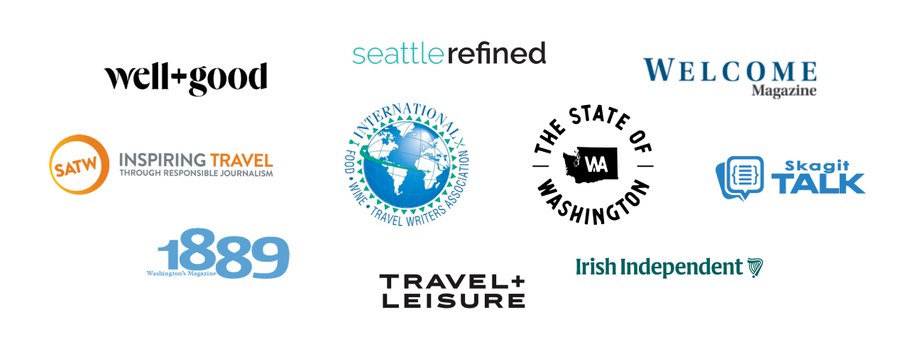 A collage of various logos for different brands and organizations, including Well+Good, Seattle Refined, Welcome Magazine, SATW Inspiring Travel, International Food and Travel Writers Association, The State of Washington, Skagit Talk, 1889 Washington's Magazine, Travel + Leisure, and Irish Independent.