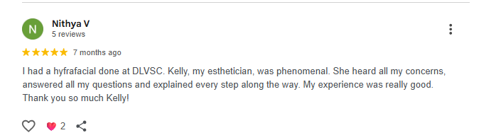 Screenshot of a five-star review on a platform, praising Kelly, an aesthetician, for a hyfrafacial treatment at DLVSC.