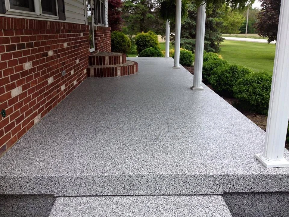 Gray and Black Flake Epoxy coating installed on a residential porch