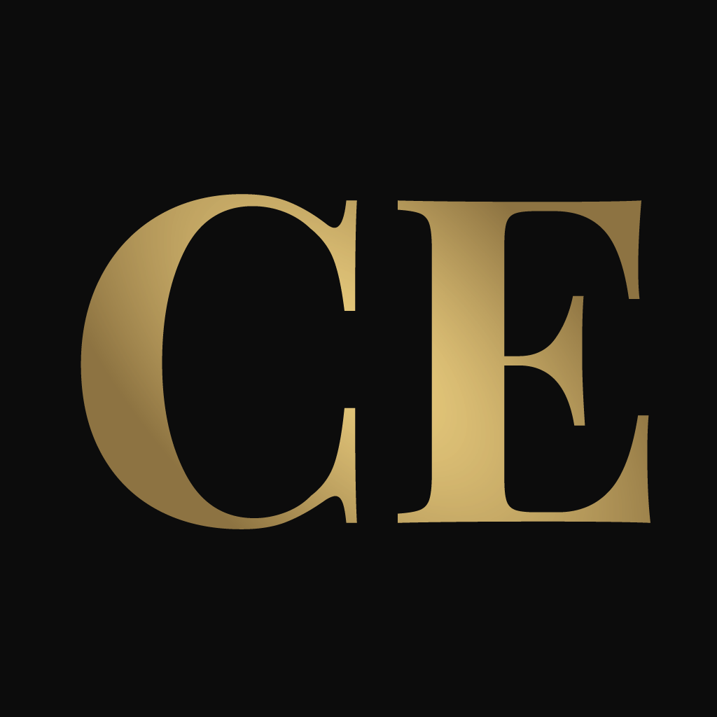 Close-up of the word "CE" written in large, gold letters on a black background.