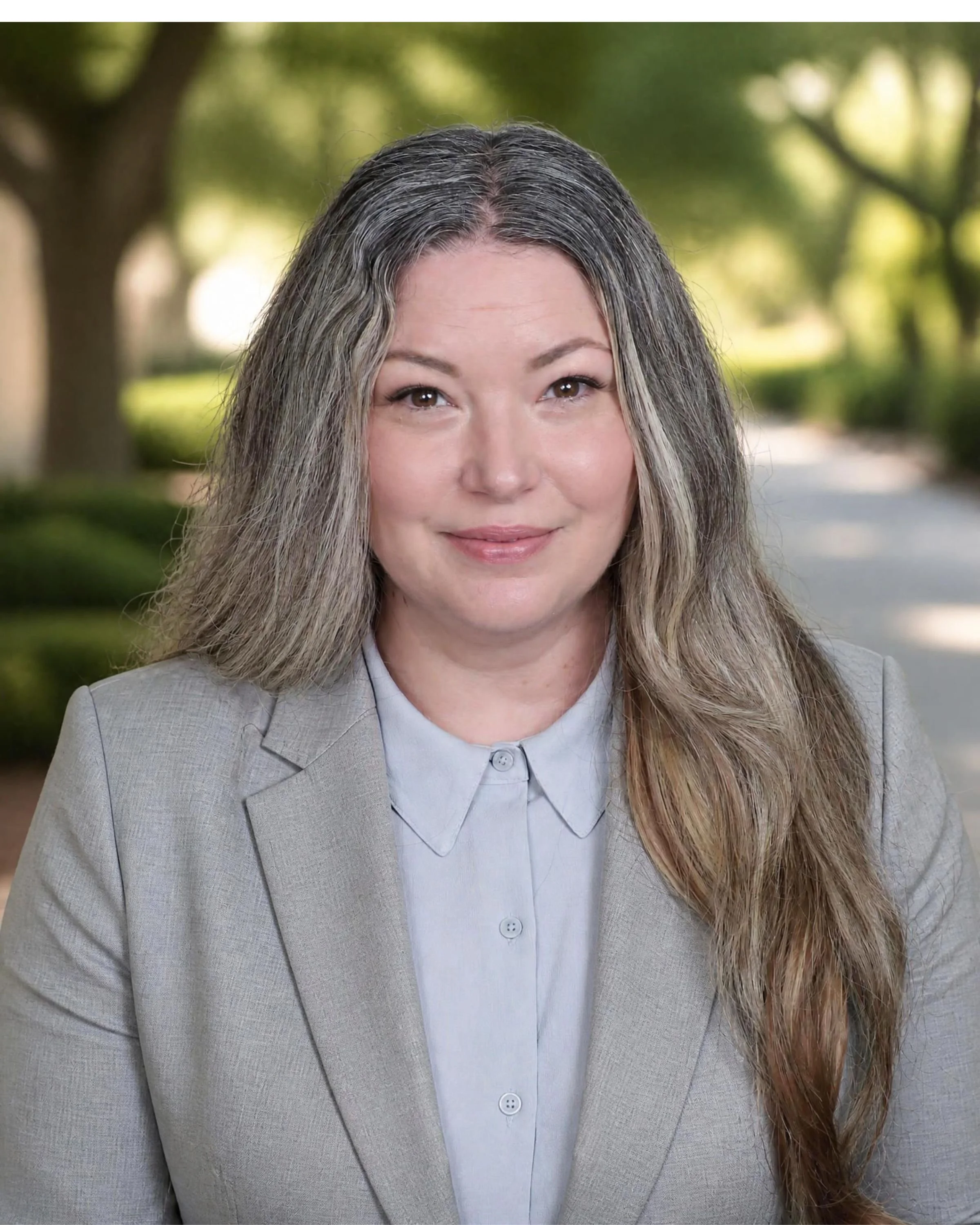 woman in tan suit