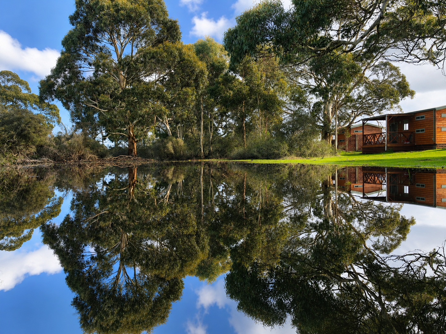 View of cabin accommodation on kangaroo island from the winter lagoon wetlands