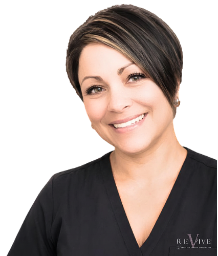 Smiling woman with short dark hair wearing a black top with a V-neck. NATASHA GREVE , Natasha Greve, Tash, Owner of Revive Clinical Aesthetics Okotoks