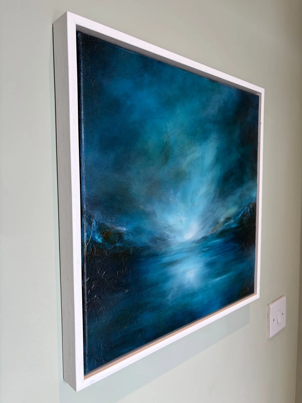 Somewhere You Knew in a white floater frame, angled view showing the frame depth