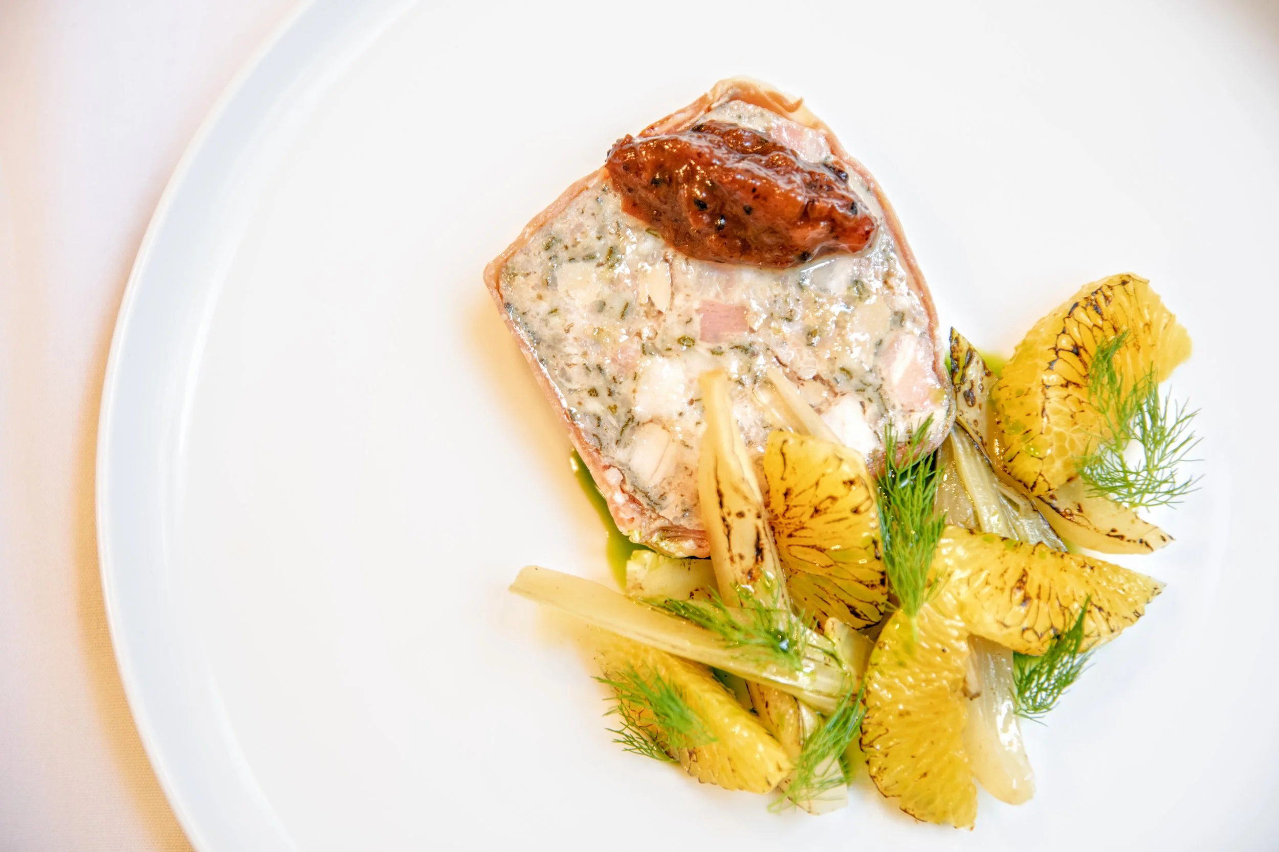 Country pork & sage terrine, confit fennel, torched grapefruit, spiced mango & persimmon chutney.