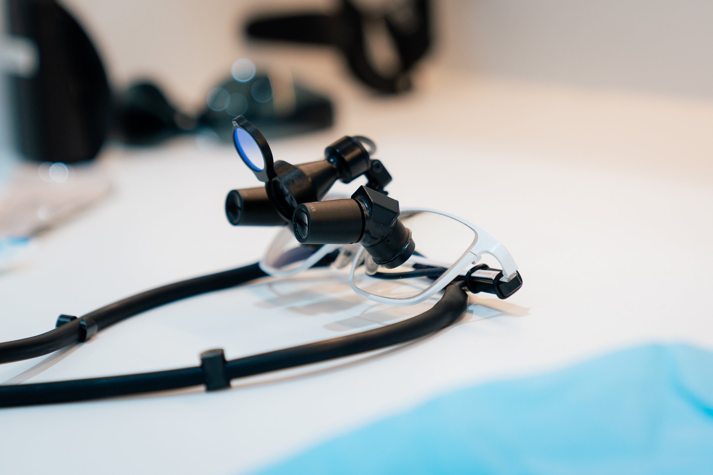 Surgical loupes and dental instruments prepared for treatment