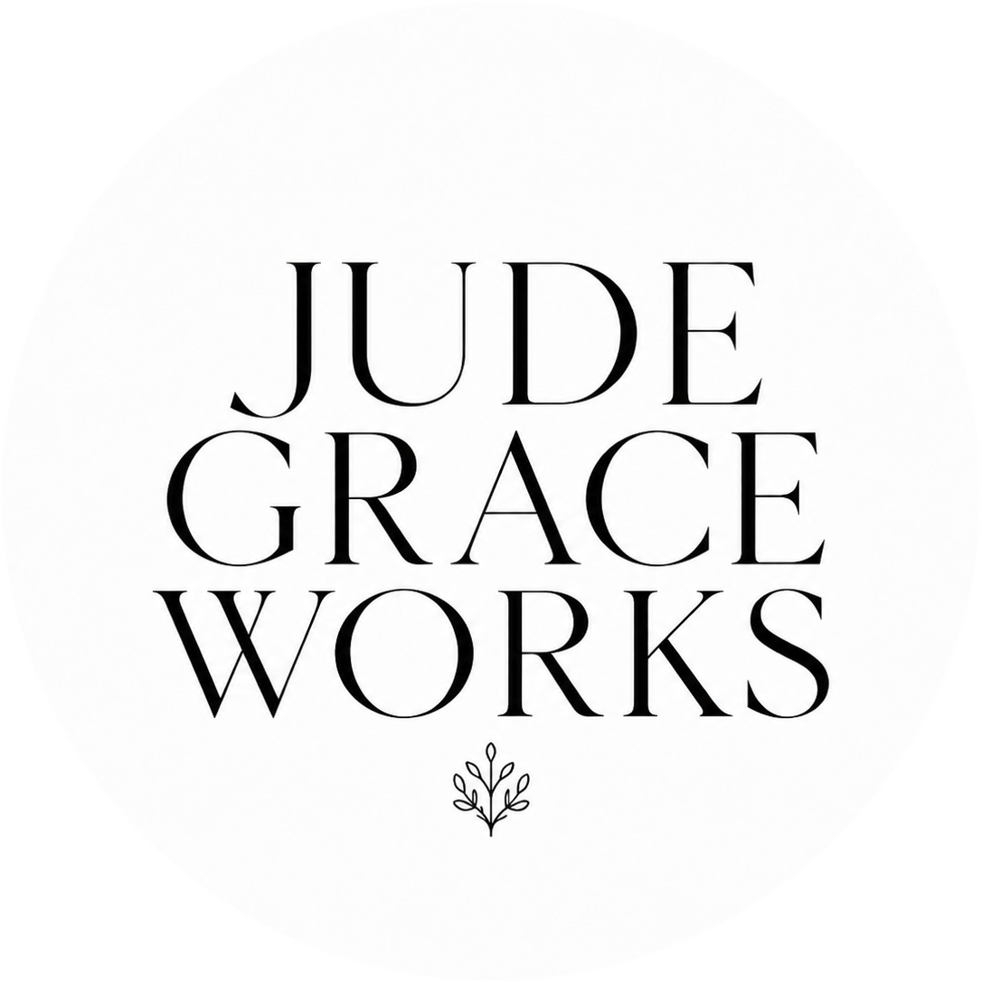 Jude Grace Works circular logo with black serif lettering and a small botanical symbol.
