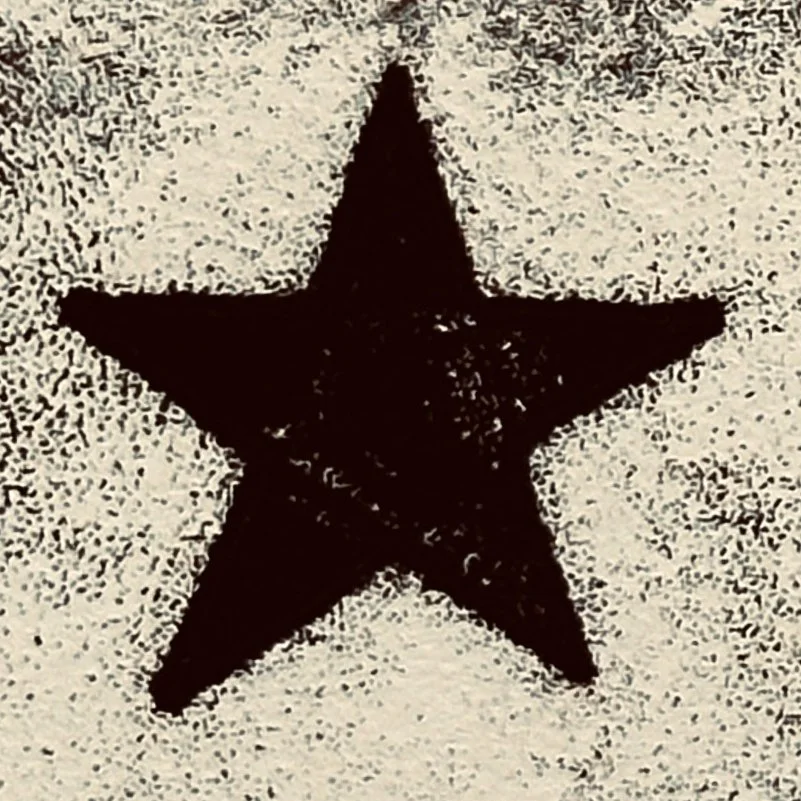 A hand-printed black star on cream paper, signifying a confident way forward that produces satisfying results.