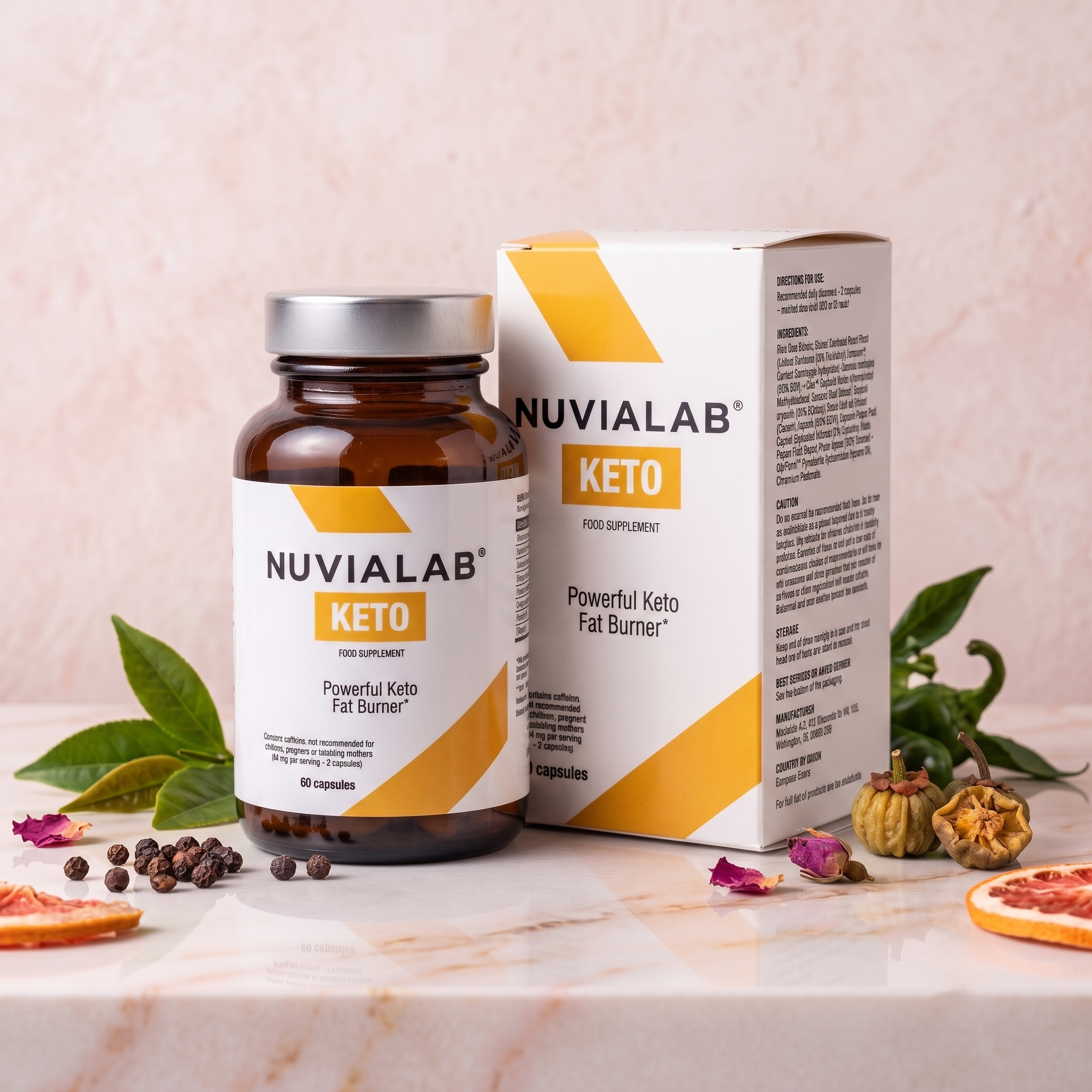A bottle of Nuvalab Keto dietary supplement capsules and a box of the same product placed on a white surface with scattered herbs and spices nearby.