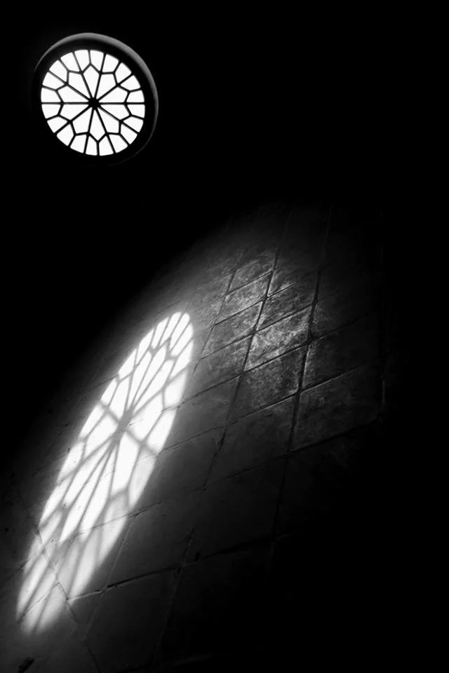 The reflection of a traditional window on ground through the sunlight, locating in one of the rooms of Hamam Fin Kashan, Fin Garden, Kashan, Iran