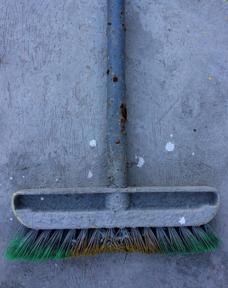 The object withdraws from its ordinary function. Detached from utility, the broom no longer serves to clean but reveals the concealed dialogue between order and decay. Every surface bears the memory of what has touched it, while every gesture of puri
