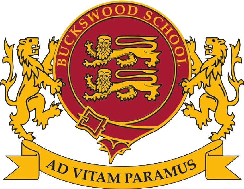 A school crest with a red circle containing three yellow lions with red tongues, flanked by two gold lions standing on their hind legs. The crest has a gold banner beneath it with the Latin phrase "Ad Vitam Paramus." The outer circle reads "Buckswood School."