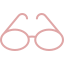 Close-up of a pink decorative hair accessory with a glittery finish.