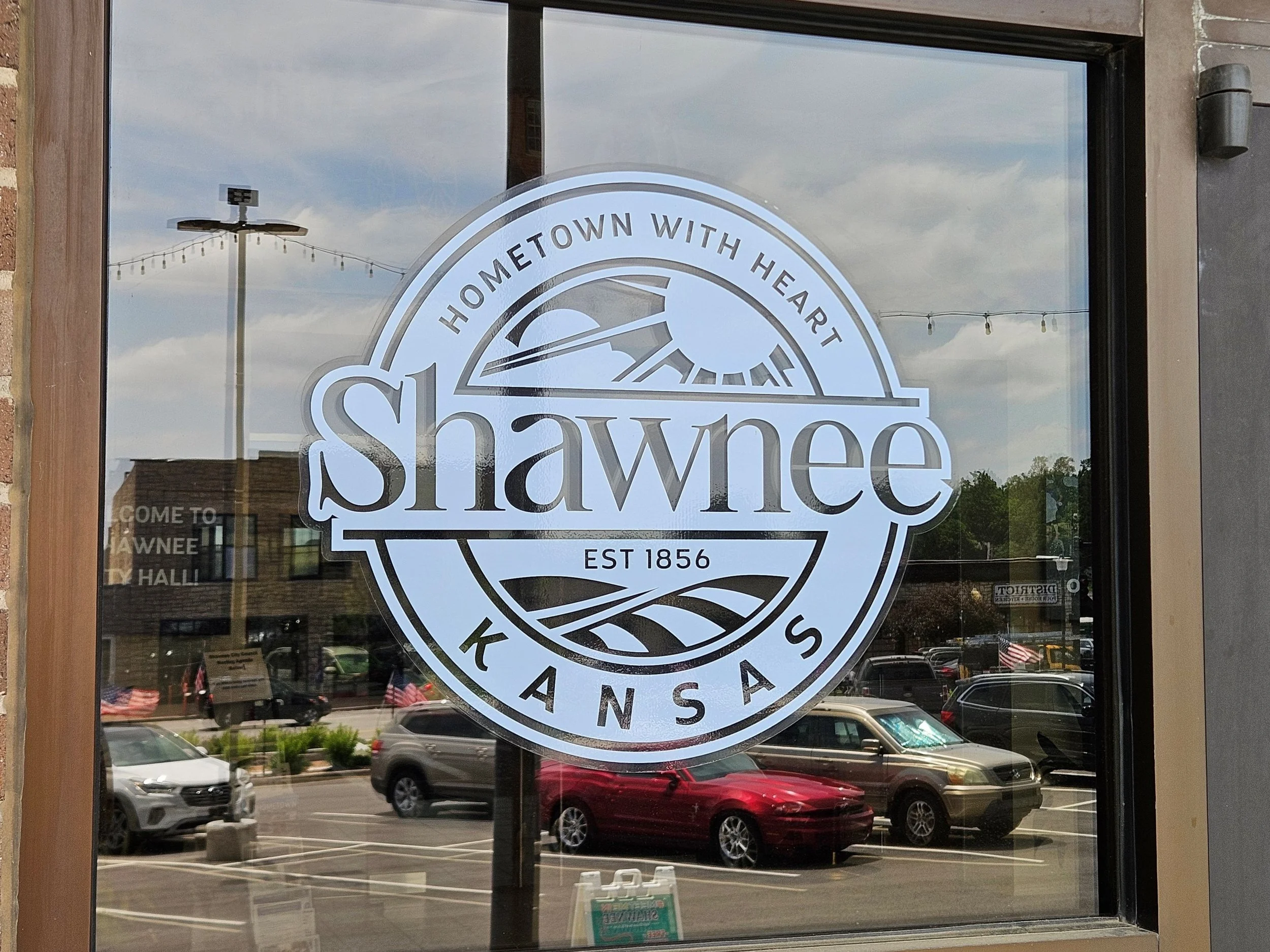 Sign on the door of Shawnee, KS city hall. A great resource for homeowner's and licensed general contractors to learn about their property and codes for the area.