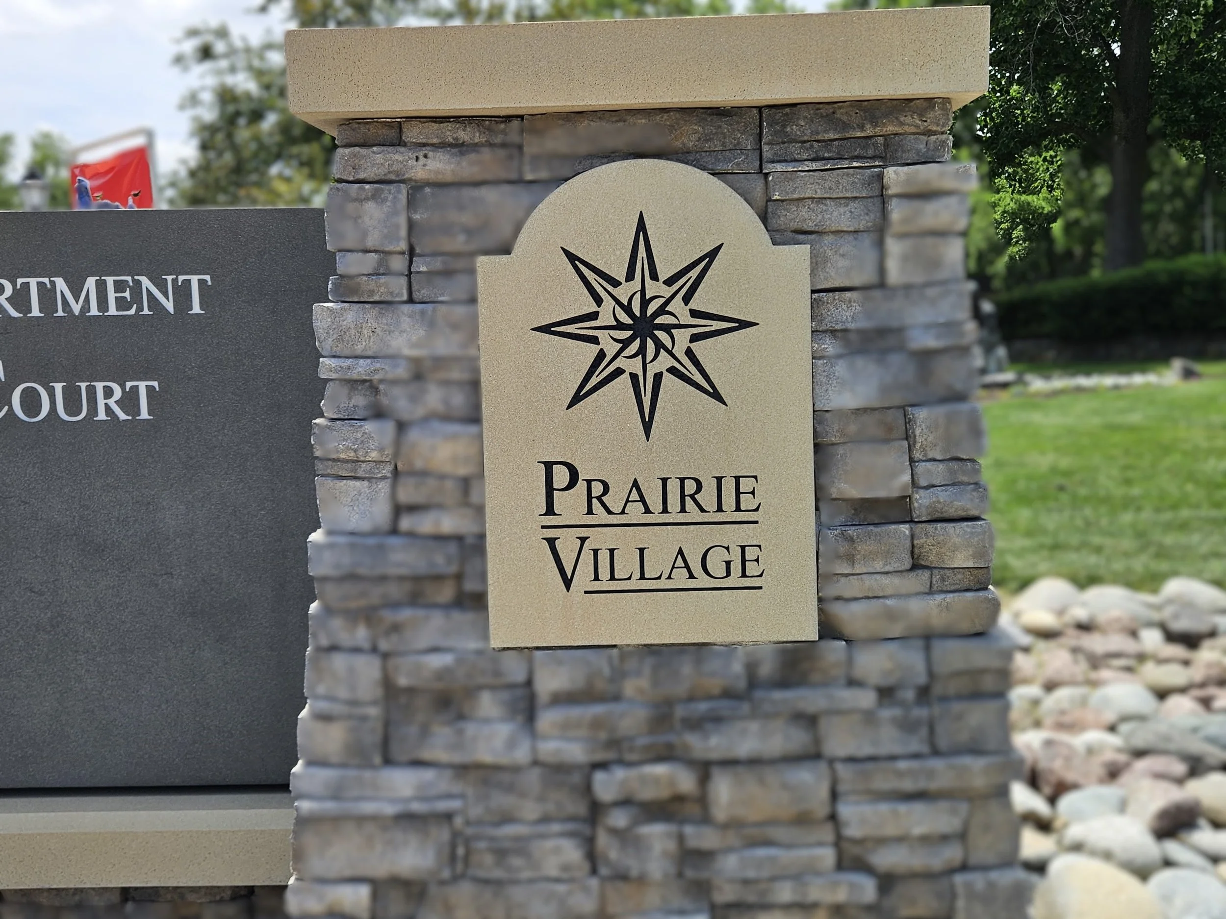 Close-up of the Prairie Village monument sign outside city hall. Where to apply for permits on home renovation services in Prairie Village KS.