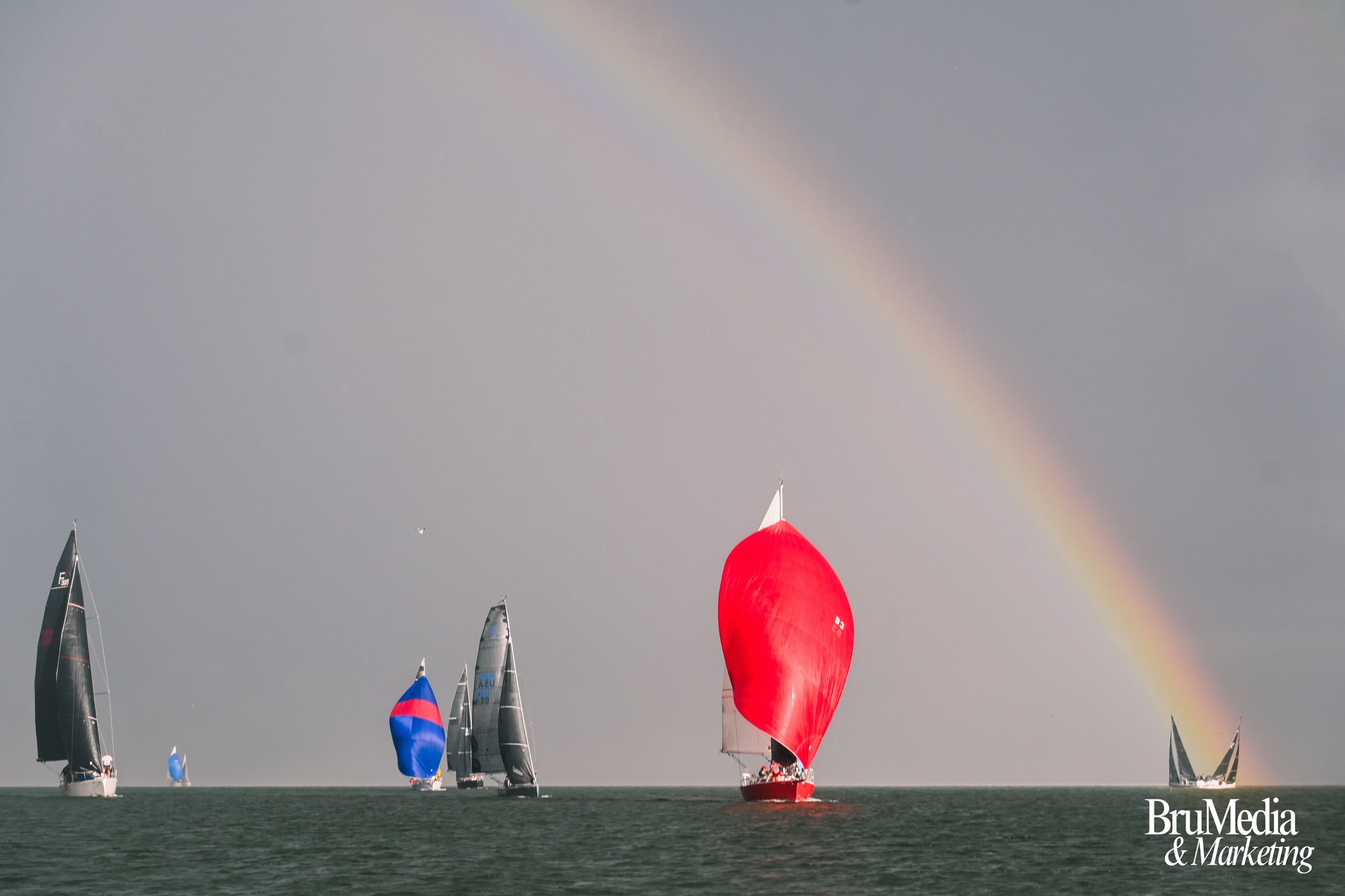 The office was wet, the team was locked in, and then the sky did the rest.

Rain, rainbows, and a fleet of boats stretched across the bay. Our team was out on the media boat, cameras rolling, and the bay putting on a show. This is the work we live fo