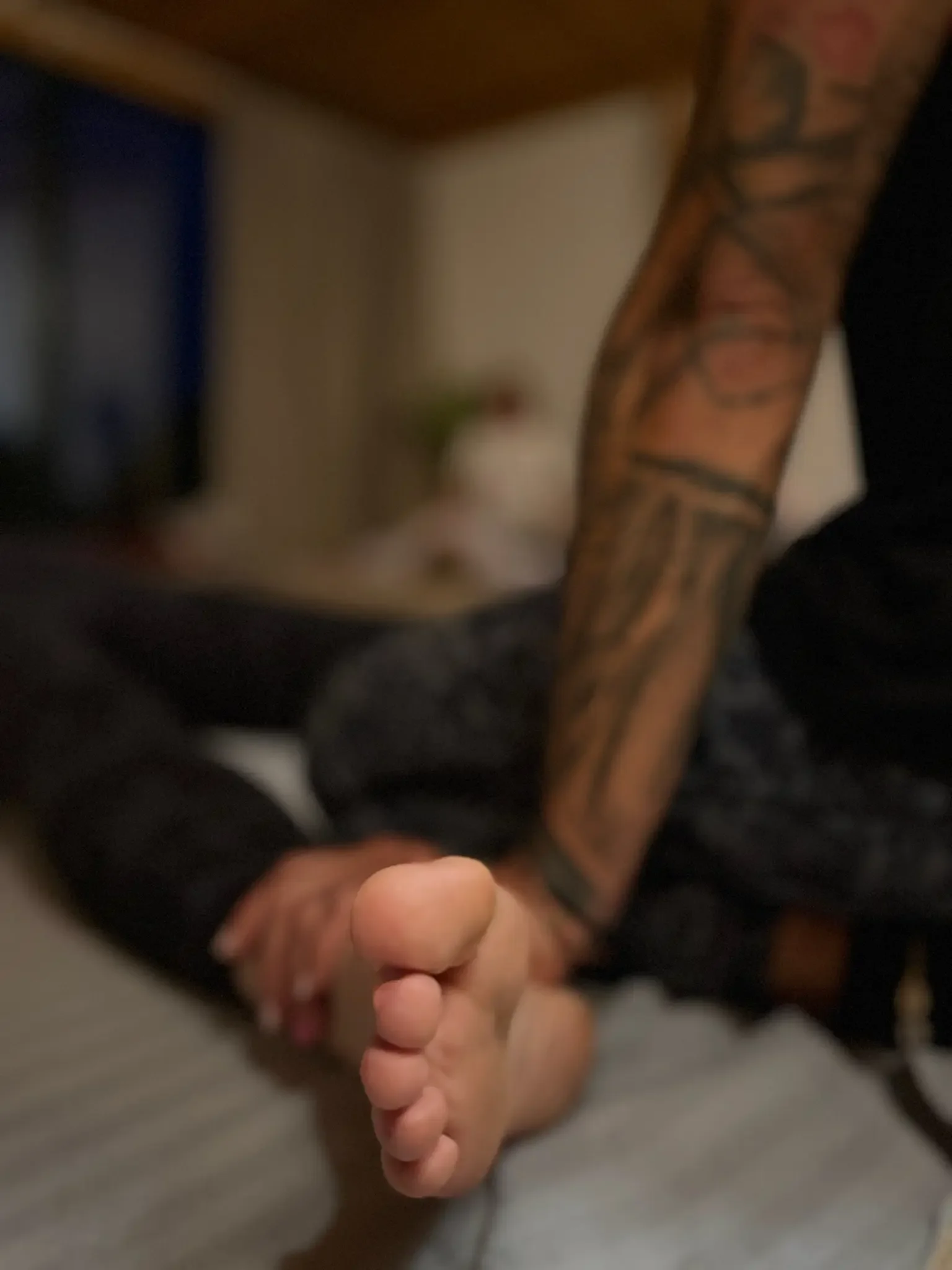 therapeutic foot massage during a mindful recovery and bodywork session