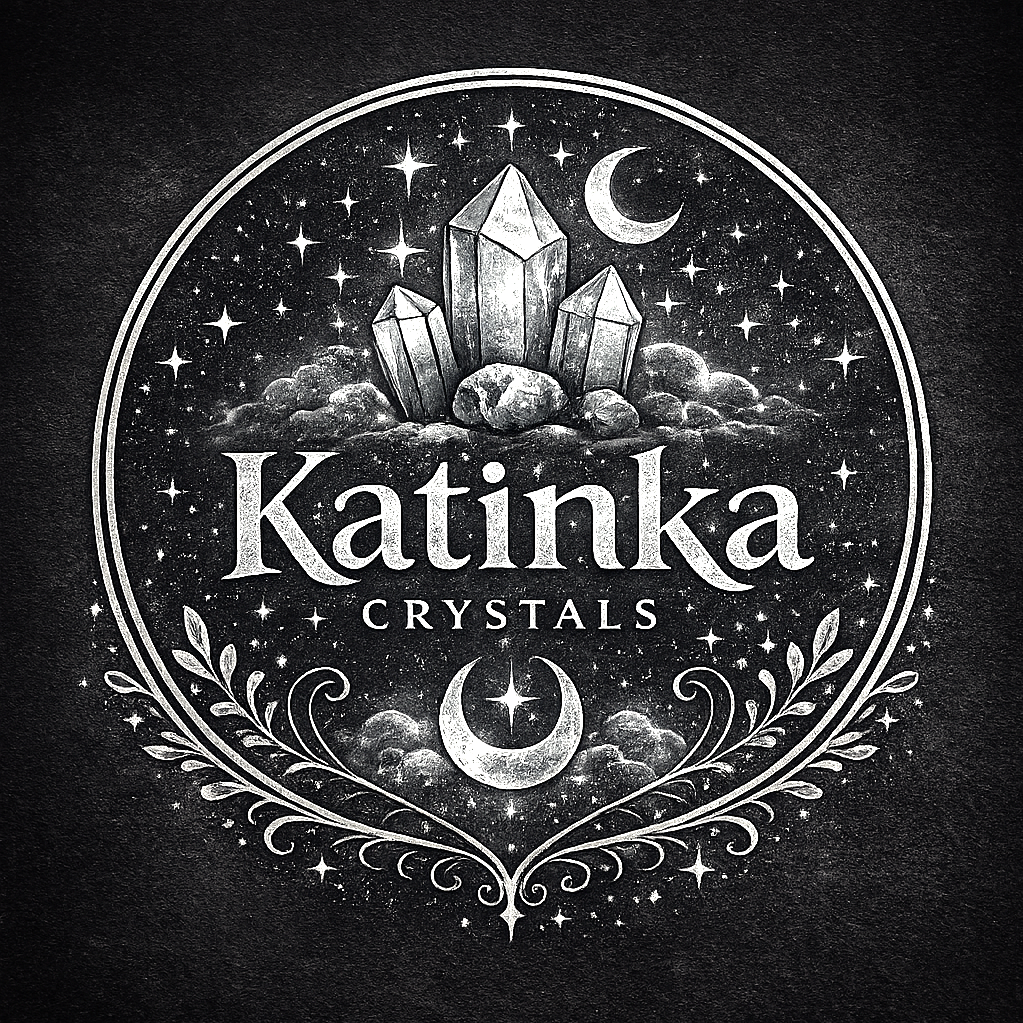 A black and white illustration of crystals surrounded by a moon and stars, with the text "Katinka Crystals" and decorative foliage.