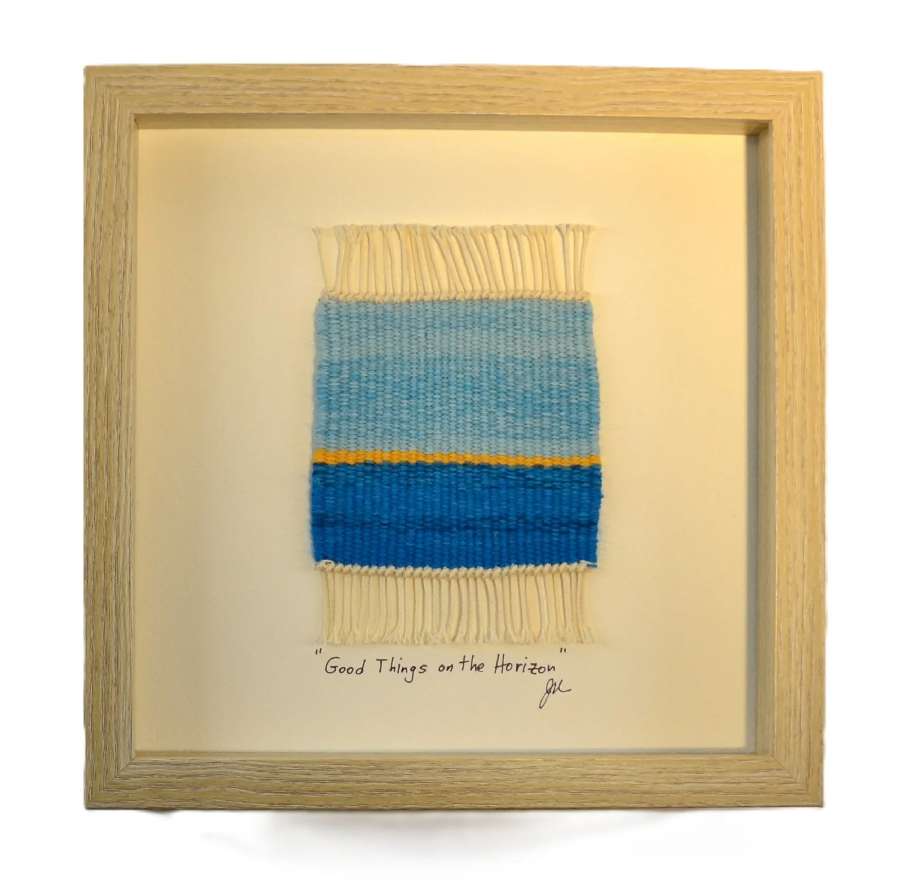 "Good Things on the Horizon", Handwoven (Wool), mounted  in a 10" x 10" x 1-3/4" blonde wooden shadow box frame.  $150 CAD