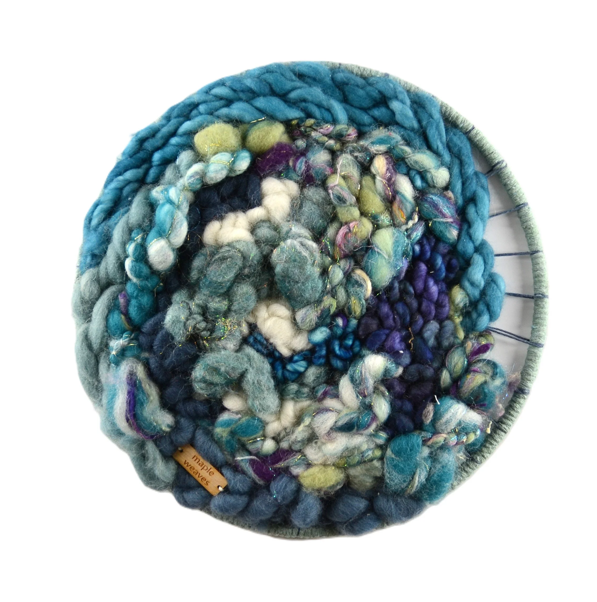 "Vortex", Handwoven (Wool, handspun yarn and cotton). Mounted in a cotton covered brass ring, 10" diameter.  $200