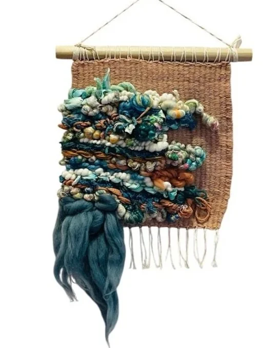 "Returning with the Tide", Handwoven (Wool, handspun yarn, cotton, silk). Hung from a wooden dowel, 9"w x 10" h.  $225